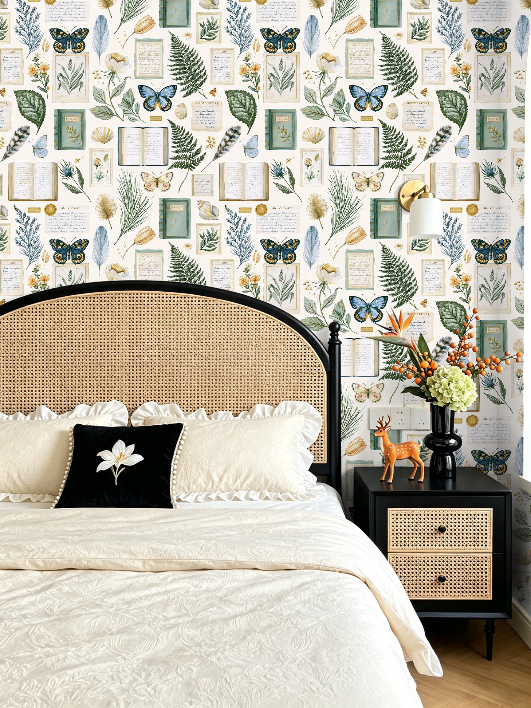 Vintage book and butterfly peel‑and‑stick wallpaper in cozy cottage‑style master bedroom